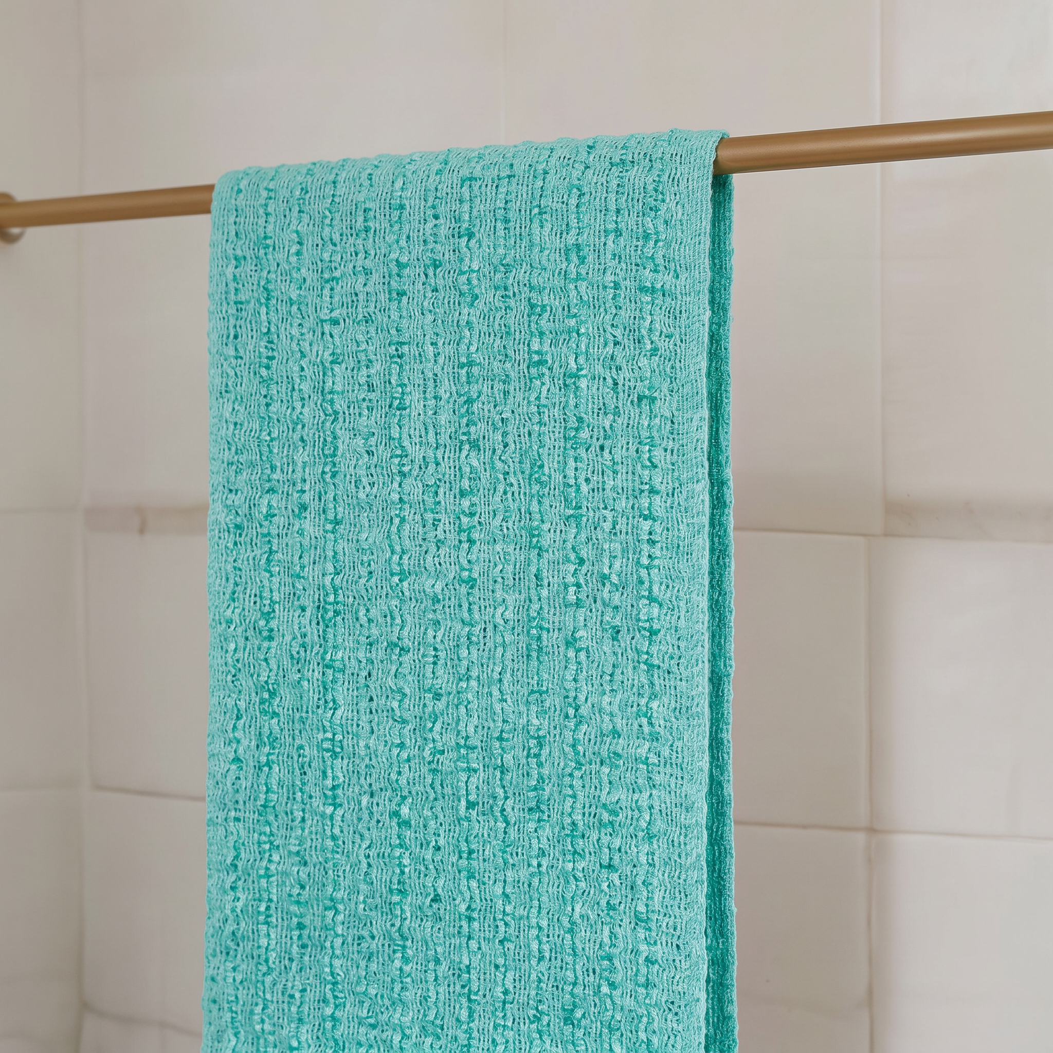 A ZONO towel hanging to dry after use